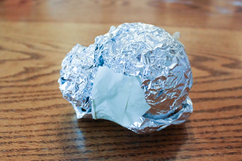 Create an ice cream sundae armature with foam balls, aluminum foil, and masking tape  #armature
